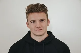 Passport-style headshot before AI upscaling — small and low resolution